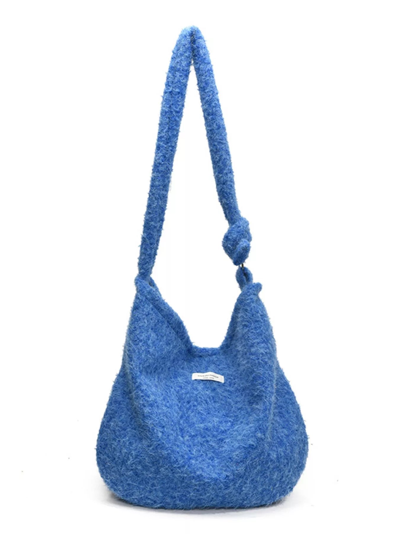 Blue textured handbag with a handle on a white background