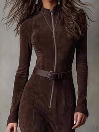Brown suede jumpsuit worn by a person against a neutral background
