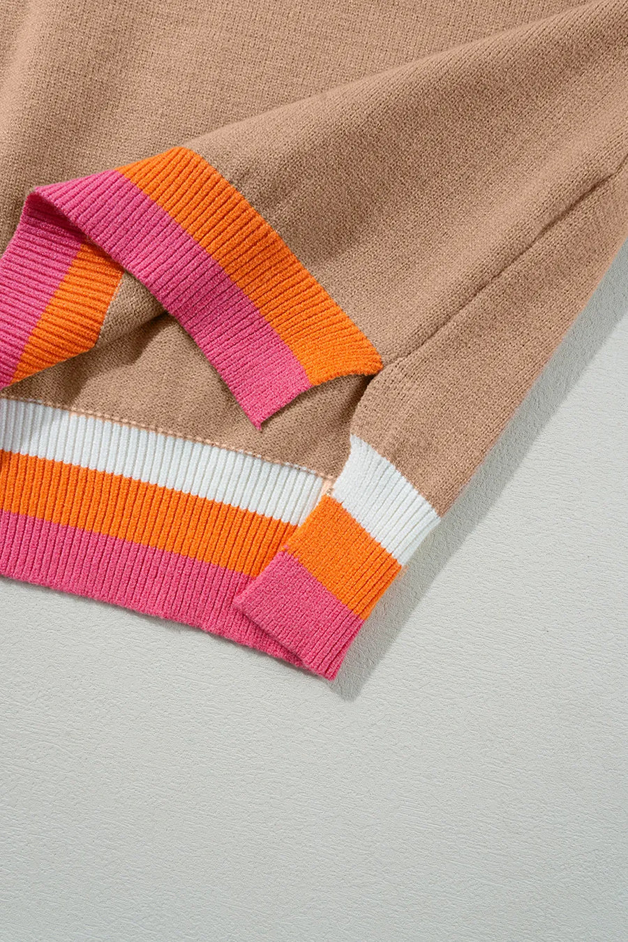 A view of colors at the hem of Contrast Round Neck Long Sleeve Sweater