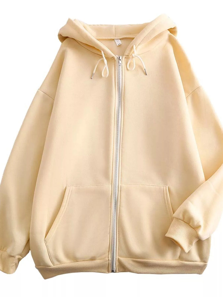 A light beige zip-up hoodie with a front zipper, drawstring hood, and kangaroo pockets, shown against a plain white background.