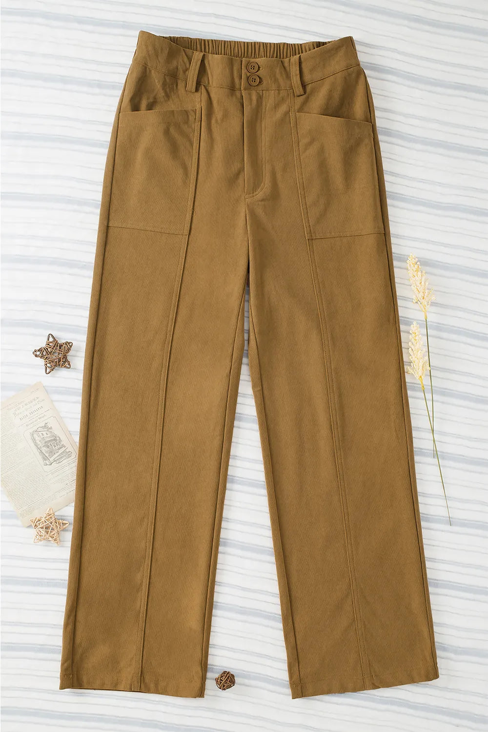 Brown pants on a textured white background