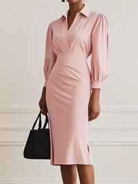 Pink dress with long sleeves and a black handbag on a white background