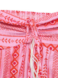 Close-up of a pink and red patterned garment with a drawstring.