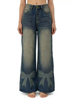 Wide-leg jeans with bow designs on a white background