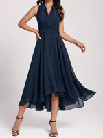 Navy blue dress with a high-low hem on a white background
