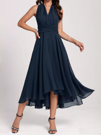 Navy blue dress with a high-low hem on a white background