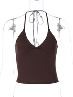 Brown halter top on a mannequin against a white background