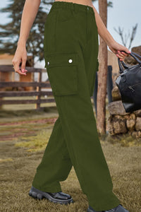 Person wearing green cargo pants in an outdoor setting