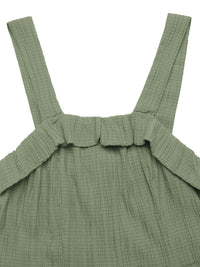 Green checkered dress with straps on a white background