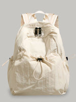 Beige backpack on a gray background
