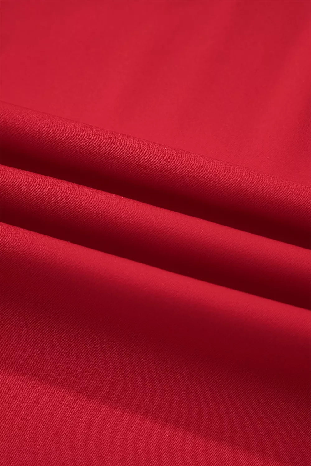 Close-up of red fabric with visible texture