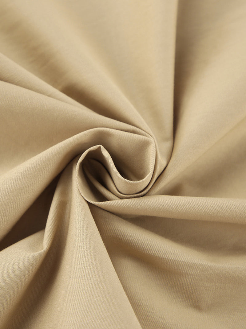 Close-up of beige fabric with folds