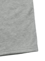 Close-up of a gray fabric corner on a white background