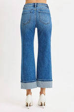 Blue jeans with a white background