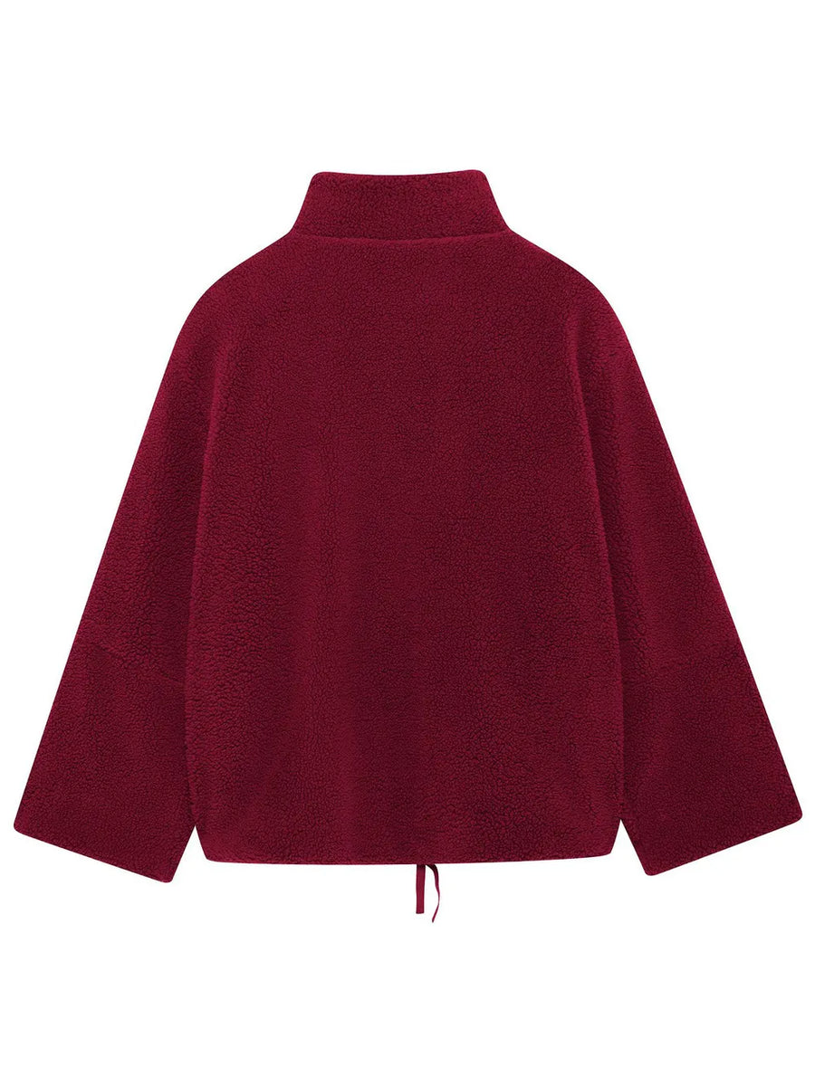 Maroon fleece jacket on a white background