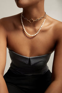 Model in a black dress wearing Eliza Necklace 