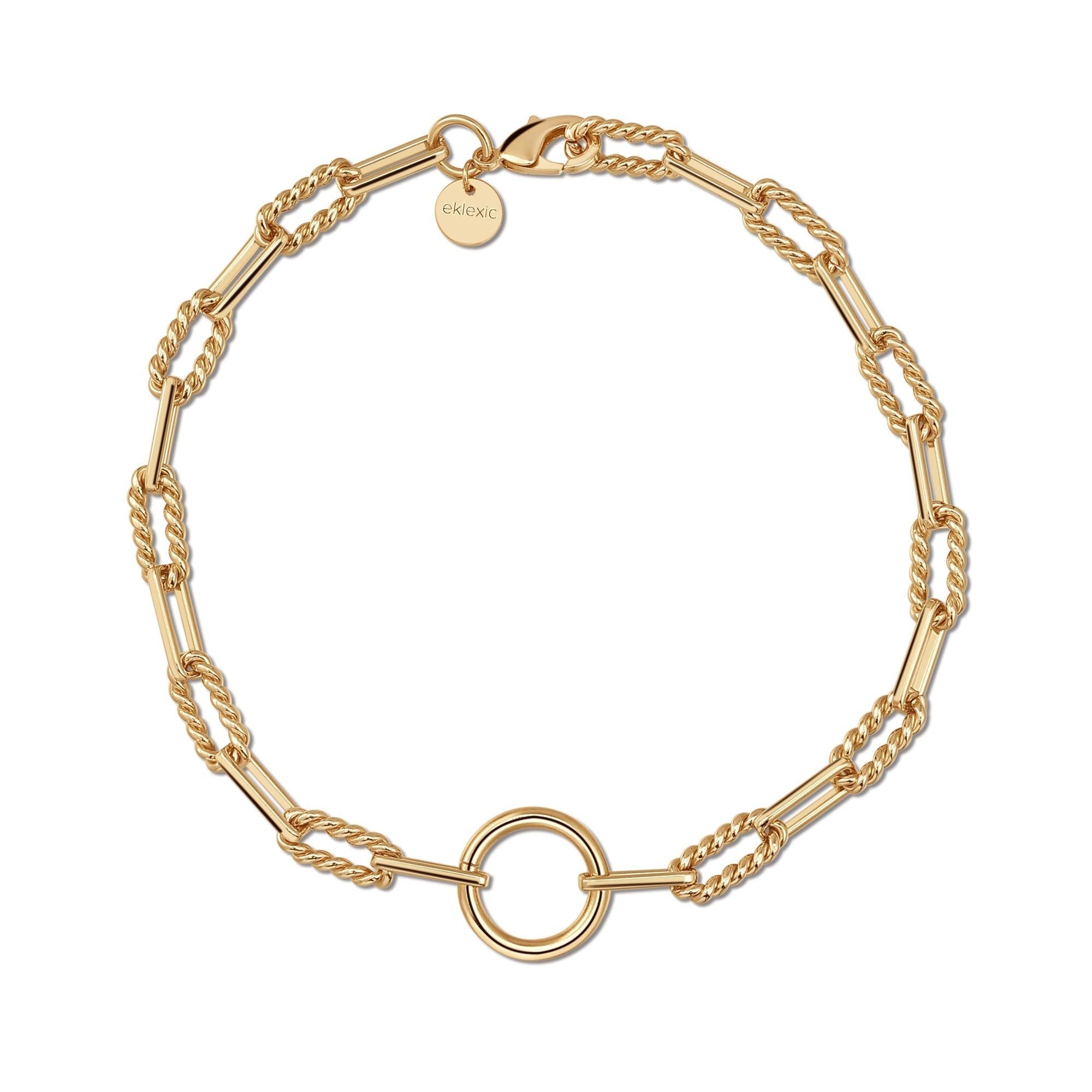 A gold-colored twisted link chain necklace with a large accent ring in the center and a secure lobster clasp.