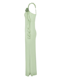 Light green one-shoulder dress with floral detail on a white background