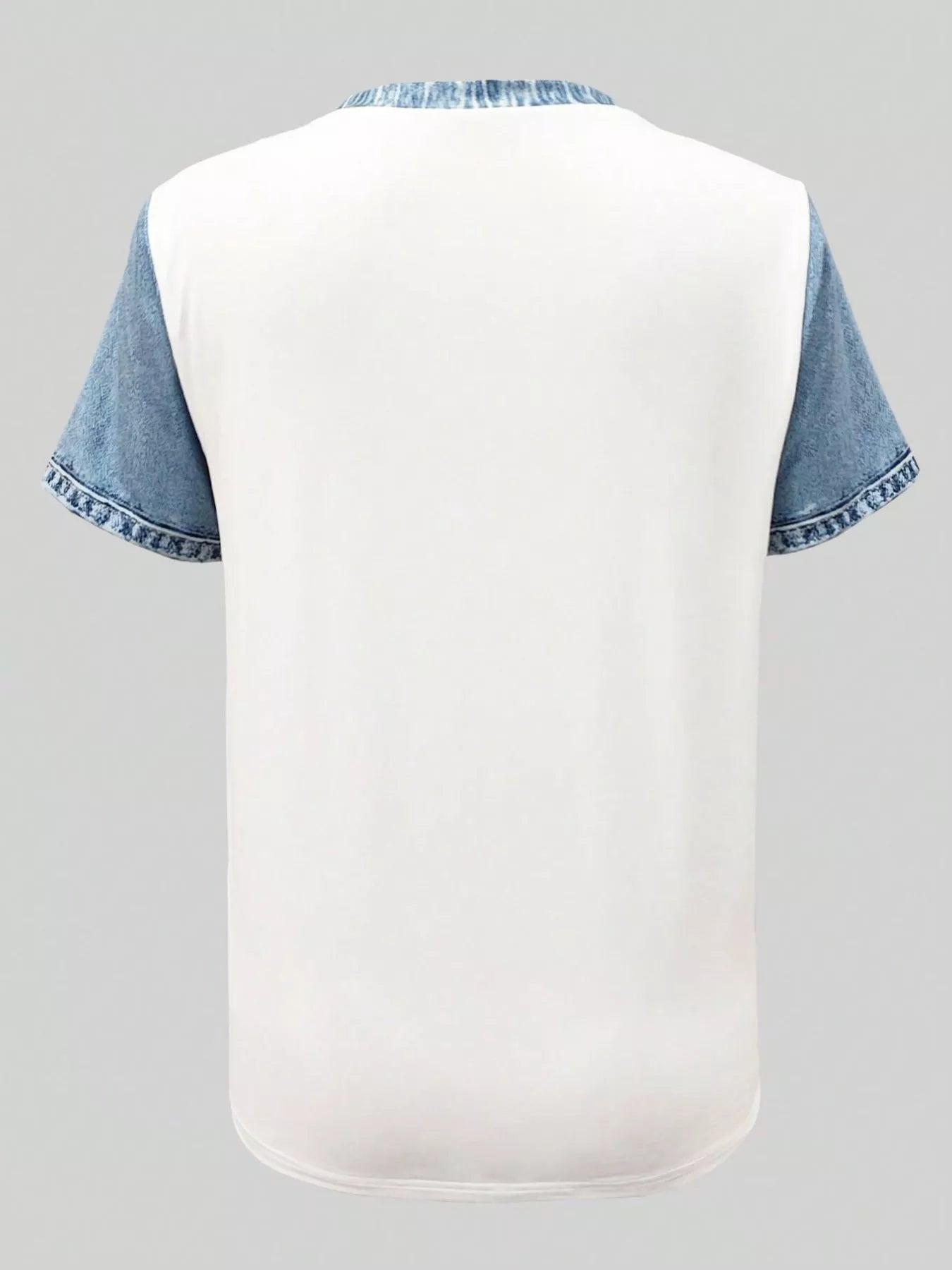 White t-shirt with blue denim sleeves on a gray background