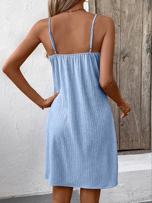 Back view of blue Ivy Lane Textured V-Neck Sleeveless Mini Cami Dress