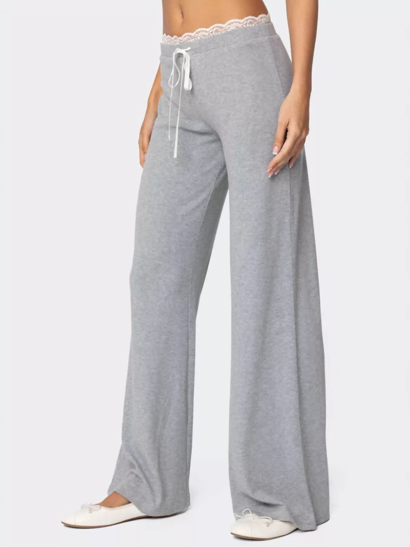 Gray wide-leg pants with lace waistband on a white background