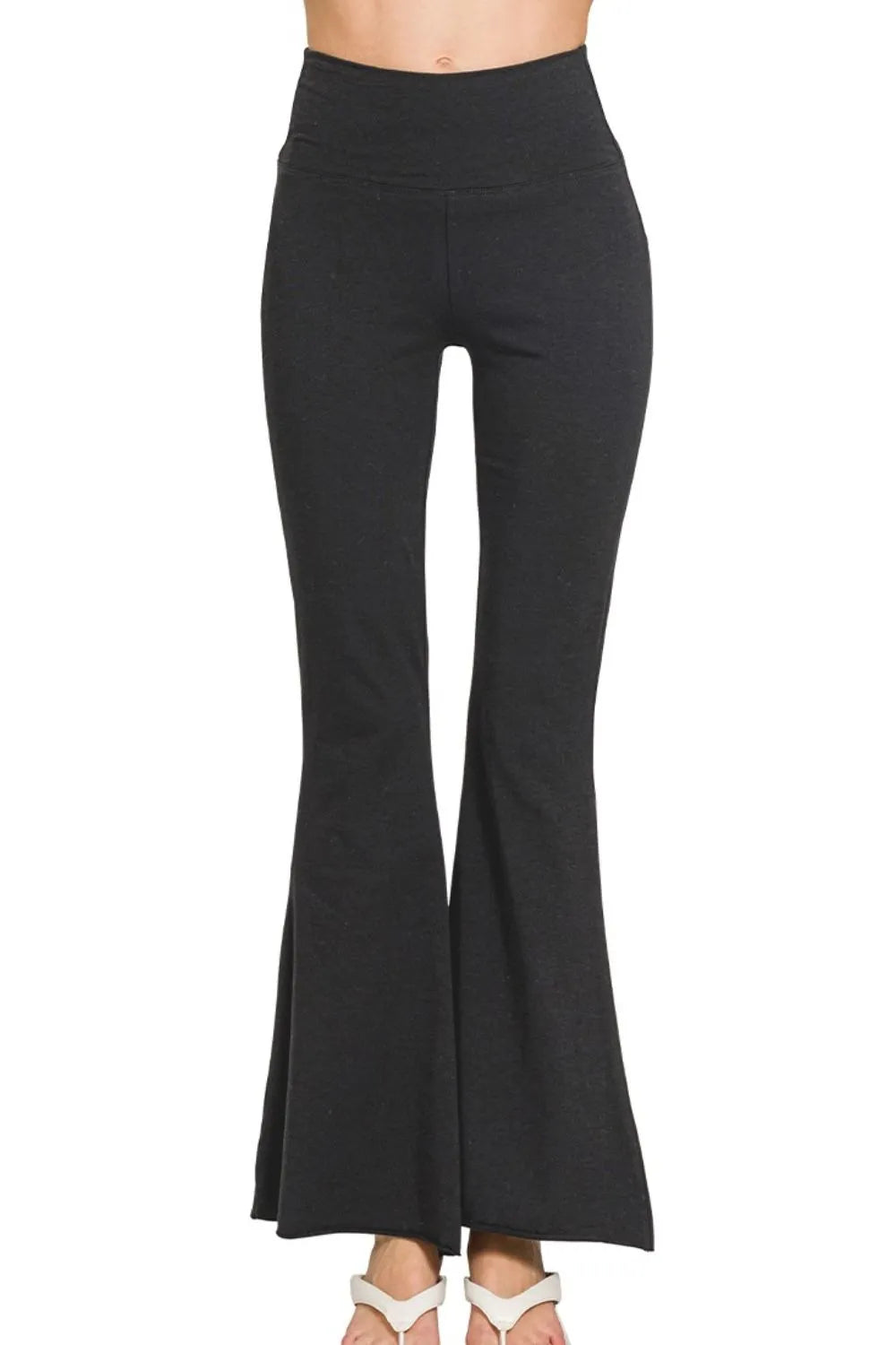 Black flared pants on a white background