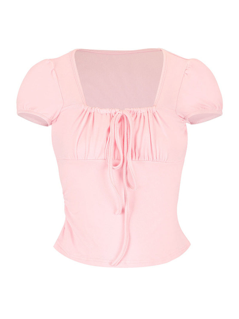 Pink blouse with short sleeves on a white background