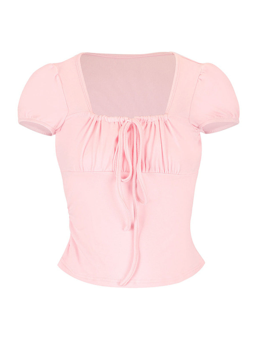 Pink blouse with short sleeves on a white background