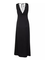 Black dress with lace detailing on a white background