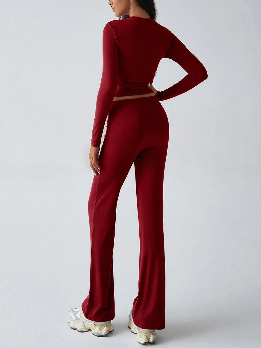 Person wearing a red outfit on a plain background