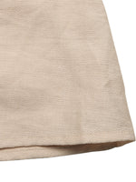 Close-up of beige fabric texture