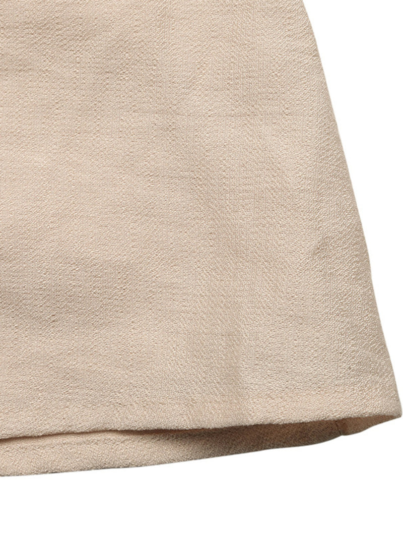 Close-up of beige fabric texture