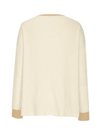 White sweater with beige cuffs and hem on a white background