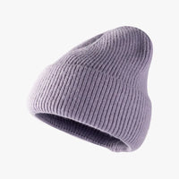 Purple knit beanie on a white background