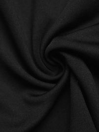 Close-up of black fabric with folds