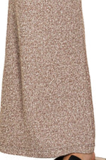 Close-up of a textured beige skirt on a white background
