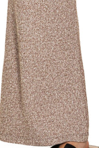 Close-up of a textured beige skirt on a white background