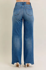 Blue jeans on a beige background