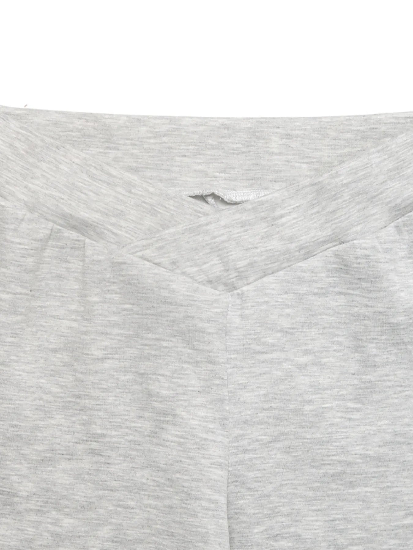 Close-up of a gray fabric with a subtle pattern on a white background