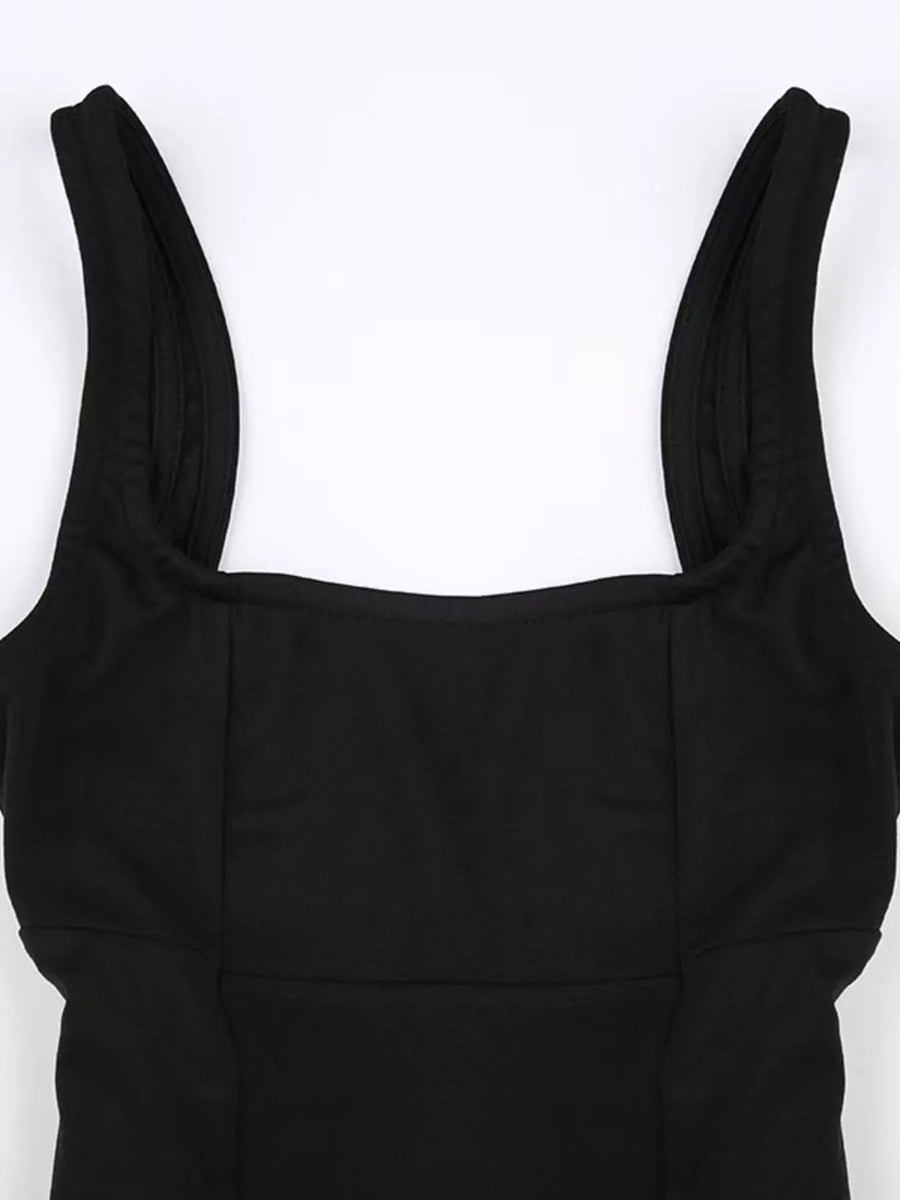 Black dress with thin straps on a white background