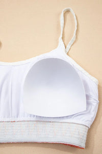 White bra on a beige background
