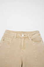 Beige jeans on a white background