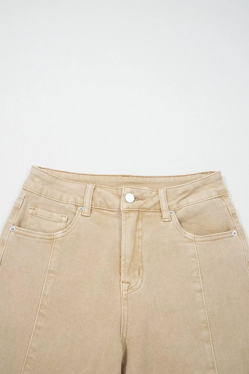 Beige jeans on a white background