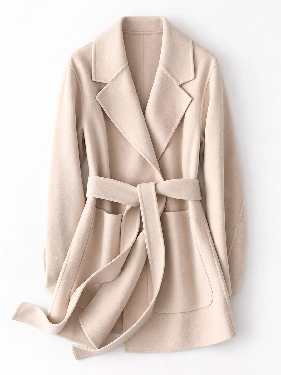 A light beige wool-blend wrap coat with a matching waist tie belt, shown on a clean white background.