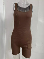 Brown sleeveless jumpsuit on a mannequin against a white background