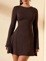 Brown long-sleeve dress on a beige background