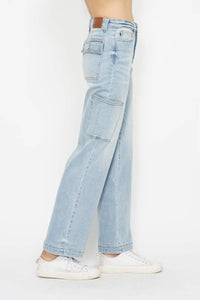 Light blue jeans worn by a person on a white background