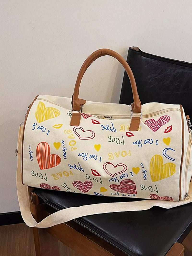 White bag with colorful heart designs and text on a chair