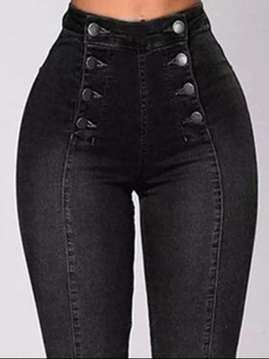 Black high-waisted jeans with button details on a gray background