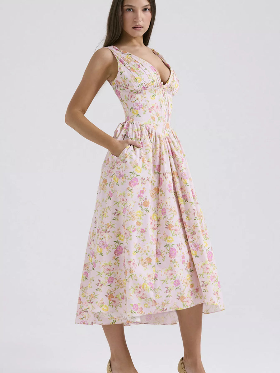 Woman wearing a floral dress on a white background